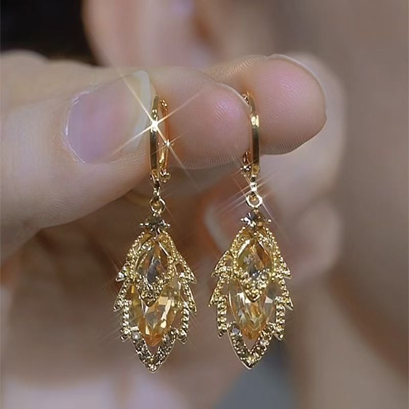 Niche Gold Zircon Leaf Stud Earrings